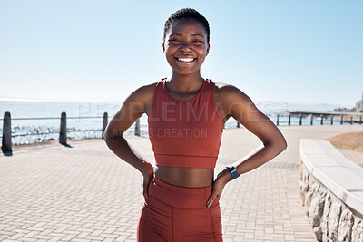 Buy stock photo Fitness, portrait or black woman runner ready for cardio training, workout or exercise by a beach in Cape Town. Wellness, face or healthy sports girl with a happy smile or freedom with body goals 