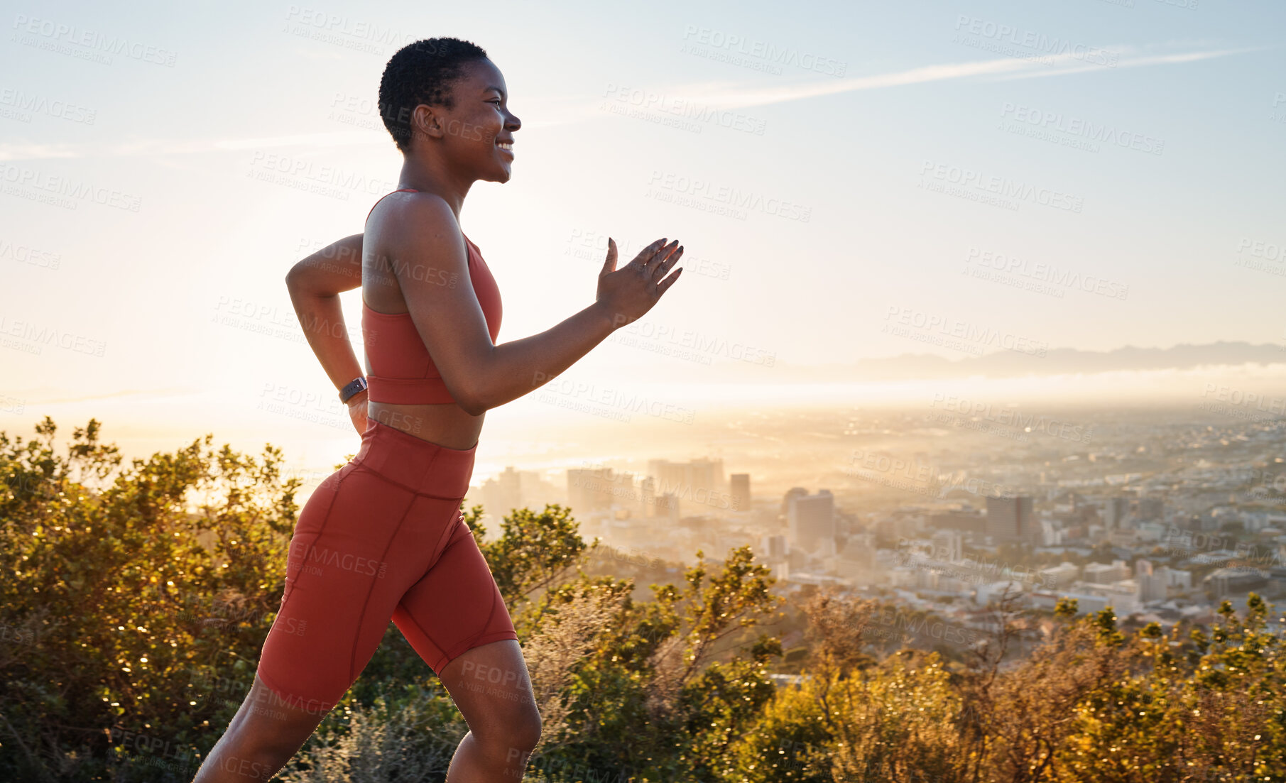 Buy stock photo Running, black woman and fitness on sunset mountains, city background and blue sky for exercise goals, energy and power. Happy athlete, cardio and outdoor workout with motivation, smile and wellness 