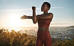 Fitness, hiking and black woman on mountain stretching, meditation and training in nature for healthy lifestyle. Health, wellness and workout for woman on cliff, yoga on hill for hike in mountains.