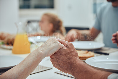 Buy stock photo Family, holding hands and praying for lunch in home dining room table. Gratitude, faith and prayer, worship or thanksgiving of parents, grandparents and children before eating food, brunch or buffet.