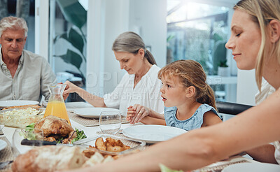 Buy stock photo Family, holding hands or praying to God for food with mother, grandparents or girl child ready for dinner meal. Christmas, worship or spiritual Christian people with faith or prayer love eating lunch