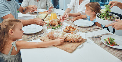 Buy stock photo Big family, food and lunch at table in home, eating and bonding. Fine dining, bread and father, mother and grandparents with girls sharing a delicious, gourmet and healthy meal together in house.