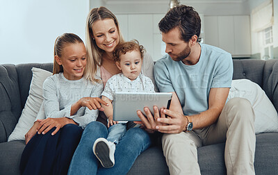 Buy stock photo Family, tablet and on couch with parents, children or watch cartoon for bonding. Mother, father and baby with female child, streaming or connectivity for social media, loving or quality time together