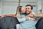 Love, couple and sofa kiss portrait in home for care, gratitude and intimate moment in home. Happy people in marriage bonding together in living room with romantic embrace with hug and smile.