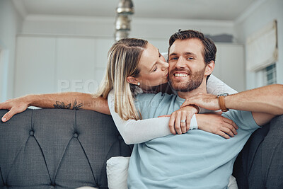 Buy stock photo Love, couple and sofa kiss portrait in home for care, gratitude and intimate moment in home. Happy people in marriage bonding together in living room with romantic embrace with hug and smile.