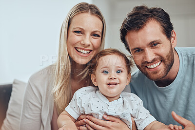 Buy stock photo Family, portrait and baby with mother and father, smiling and bonding. Love, care and happy infant, kid or child with parents, man and woman, having fun and enjoying quality time together in house.