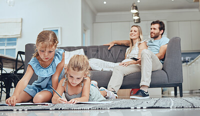 Buy stock photo Relax, children drawing and parents on sofa in the living room bonding, homeschool and kids learning. Education, family and girls doing homework on the floor with mother and father sitting on couch.