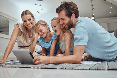 Buy stock photo Happy family, bonding or lying children on tablet in house or home living room on social media website, video call or movie streaming app. Smile, kids and mother, father or parents on technology show