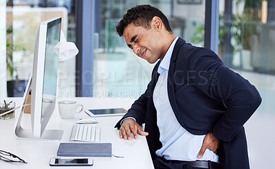 Buy stock photo Back pain, business man and stress of a office consultant with burnout and anxiety at desk. Computer, businessman and working strain from a risk management worker looking for back support online