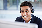 Businessman, computer or call center in telemarketing help company, customer support office or b2b sales CRM. Smile, happy or talking receptionist worker with technology headset in Indian contact us