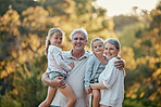 Grandparents, kids and smile at outdoor, park or backyard for bonding, love and care in nature. Senior couple, girl children and happiness together for vacation, portrait and sunshine in Los Angeles