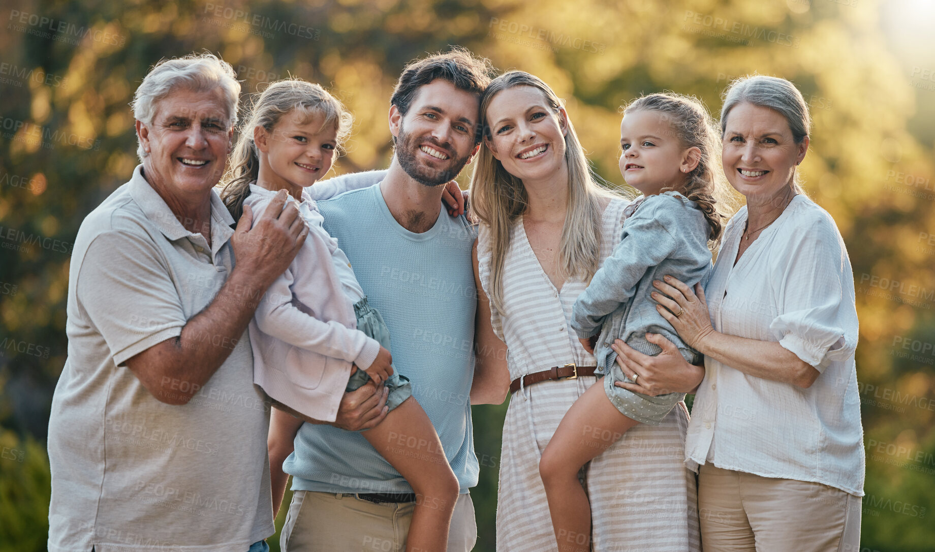 Buy stock photo Love, family and grandparents with girls, parents and smile together for bonding, loving and garden. Portrait, grandmother and grandfather with mother, father and daughters for vacation and park.