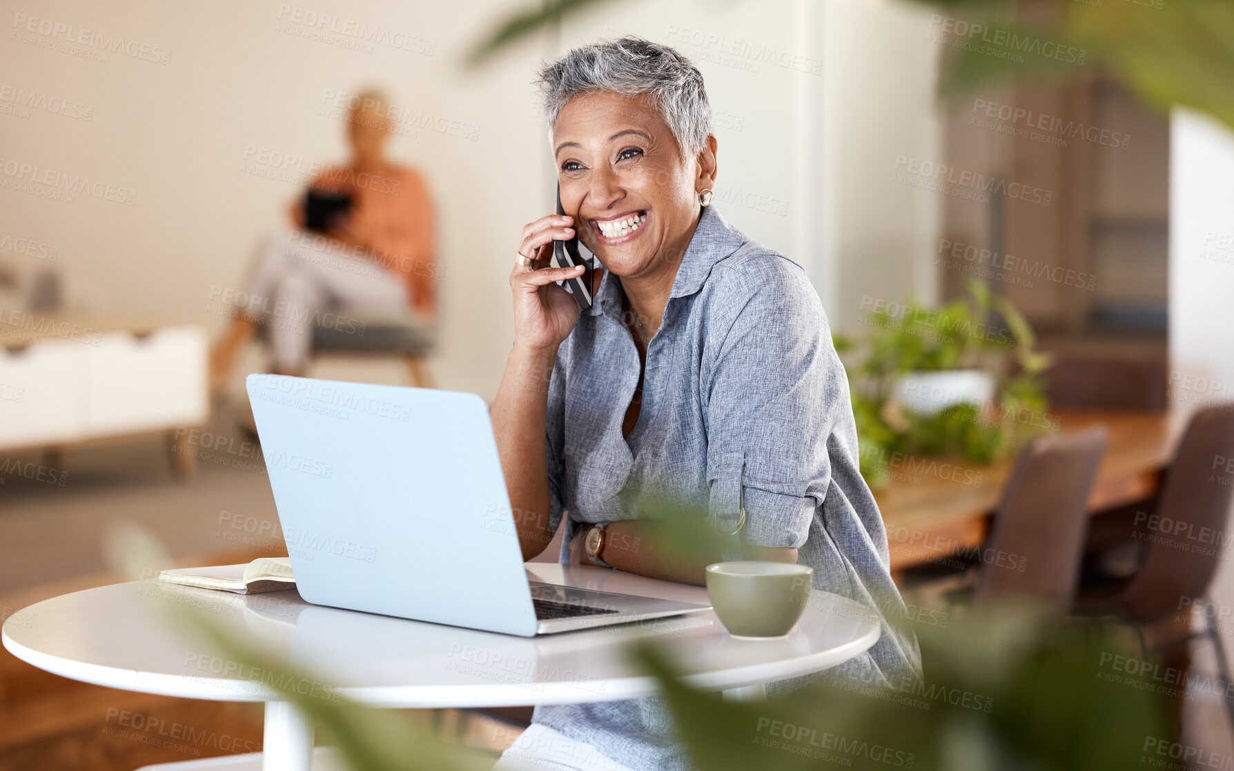 Buy stock photo Cafe, phone call and senior woman talking, chatting or speaking. Remote worker, freelancer and happy elderly female in coffee shop with laptop and networking, discussion or conversation on smartphone
