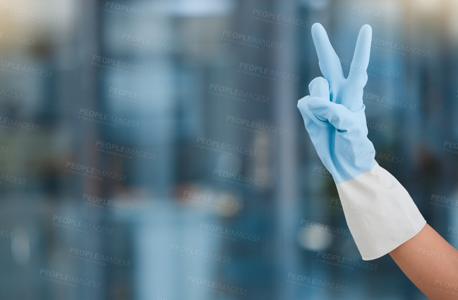 Buy stock photo Hand, peace and mockup with a woman cleaner in an office for hygiene or company housekeeping. Cleaning, job and service with a female housekeeper gesturing a hand sign while in a workplace to clean