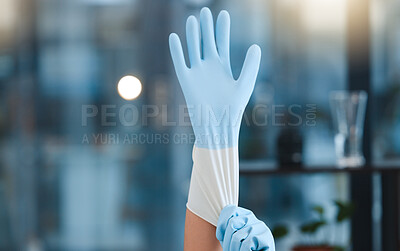 Buy stock photo Hands, cleaning gloves and woman in home getting ready for hygiene at night. Spring cleaning, cleaning service and maid, worker or cleaner preparing to start washing or disinfection in dark house