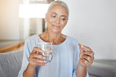 Buy stock photo Senior woman, pregnancy pills and water in home on sofa for ivf healthcare treatment, mother wellness and prenatal care. Elderly woman, drink vitamin medicine and pregnant pharmaceutical support