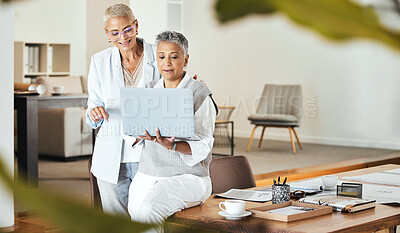 Buy stock photo Laptop, discussion and senior business women in office for planning, brainstorming ideas and strategy. Collaboration, partnership and female employees working on business proposal, project and report