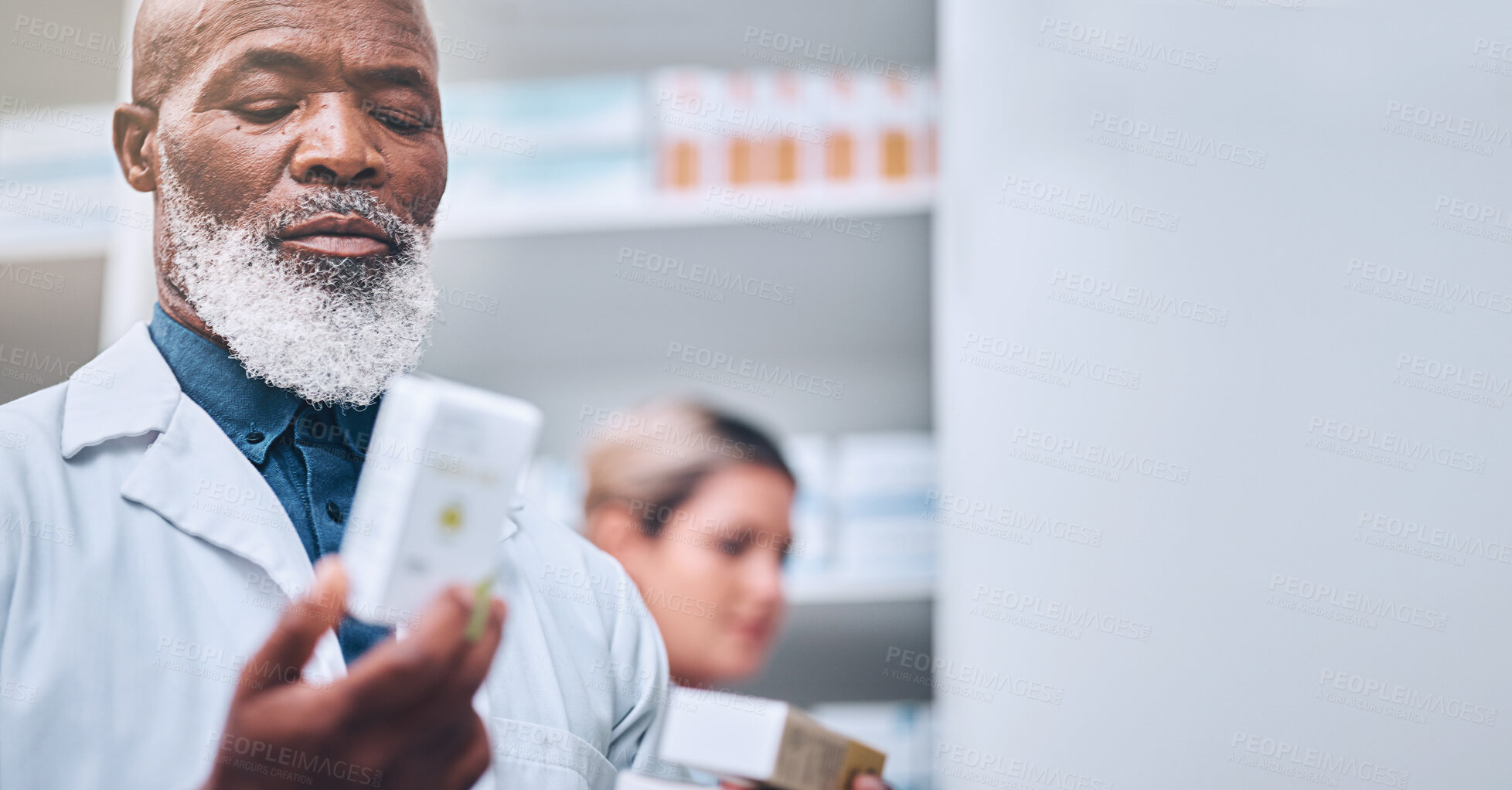 Buy stock photo Pharmacy, black man and hand of pharmacist with medicine box mock up. Pills, medication and senior male medical professional with drugs for prescription, healthcare and wellness, cure or treatment.