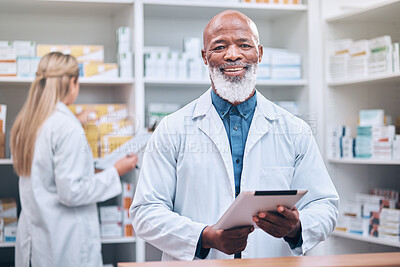 Buy stock photo Portrait, pharmacist or black man with a tablet for healthcare research or medicine list at a drug store or pharmacy clinic. Face, doctor or happy senior worker smiles with pride, goals or trust