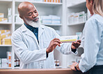 Consulting, medicine and pharmacy with black man and customer for healthcare, help or prescription. Shopping, retail and pills with pharmacist and patient for medical, wellness or medication checkout