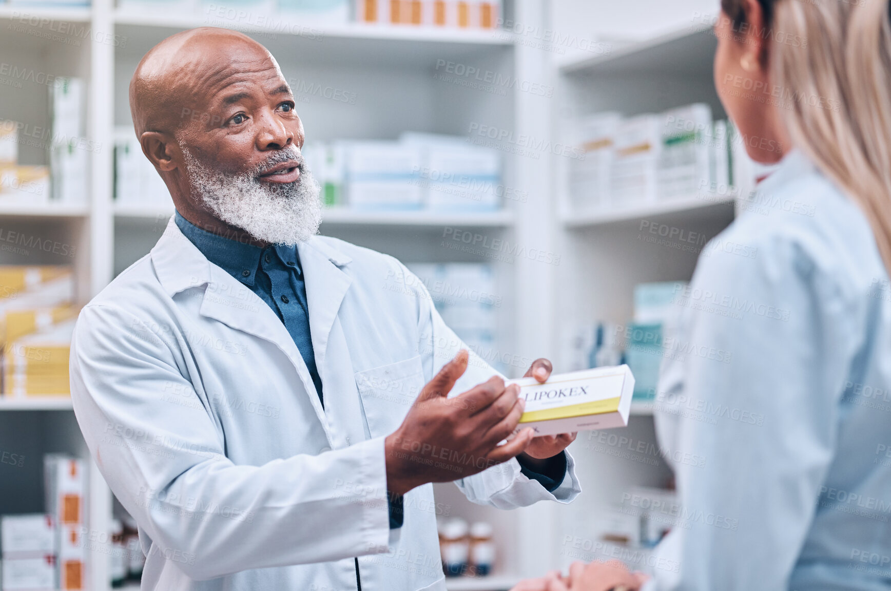 Buy stock photo Healthcare, pharmacist and man at counter, medicine, prescription drugs and happy service at drug store. Health, wellness and medical insurance, black man and woman at pharmacy for advice and pills.