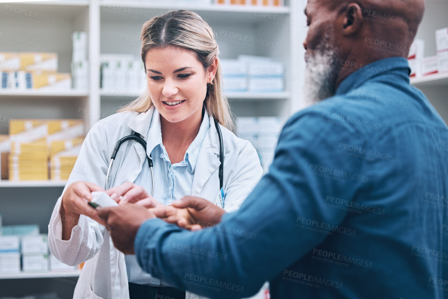 Buy stock photo Healthcare, pharmacist and man at counter, medicine, prescription drugs and happy service at drug store. Health, wellness and medical insurance, black man and woman at pharmacy for advice and pills.