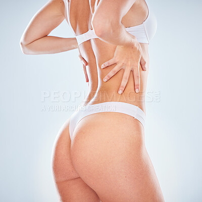 Fit Topless Woman Showing Back Muscles Shot From Behind Stock