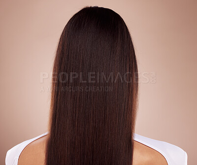 Buy stock photo Beauty, hair care and back of woman in studio isolated on a brown background. Balayage, hairstyle and female model with long, healthy and beautiful hair after salon treatment for texture and growth.