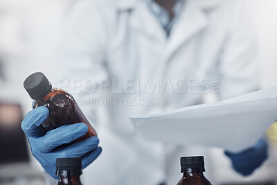 Buy stock photo Hands, bottle and science with a doctor man at work in a laboratory for research or medical innovation. Healthcare, analytics and vaccine with a medicine professional working on development in a lab