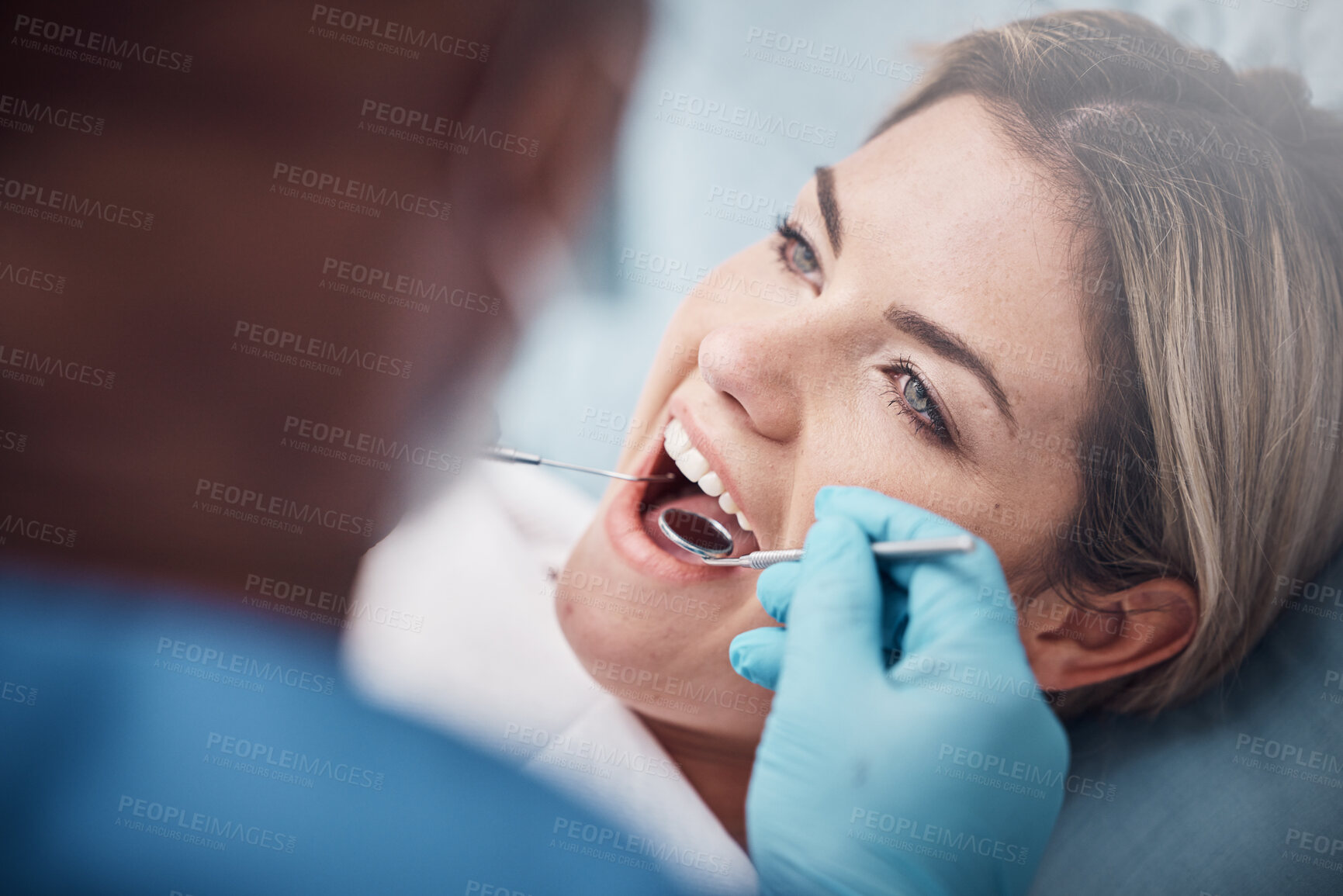 Buy stock photo Teeth, dental or woman at a dentist for surgery, teeth whitening or mouth cleaning for gum disease bacteria. Wellness, tooth decay or hands helping or working with oral tools in healthcare clinic