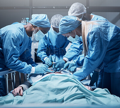 Buy stock photo Doctors, surgery and collaboration with a medicine team in scrubs operating on a man patient in a hospital. Doctor, nurse and teamwork with a medical group in a clinic to perform an operation