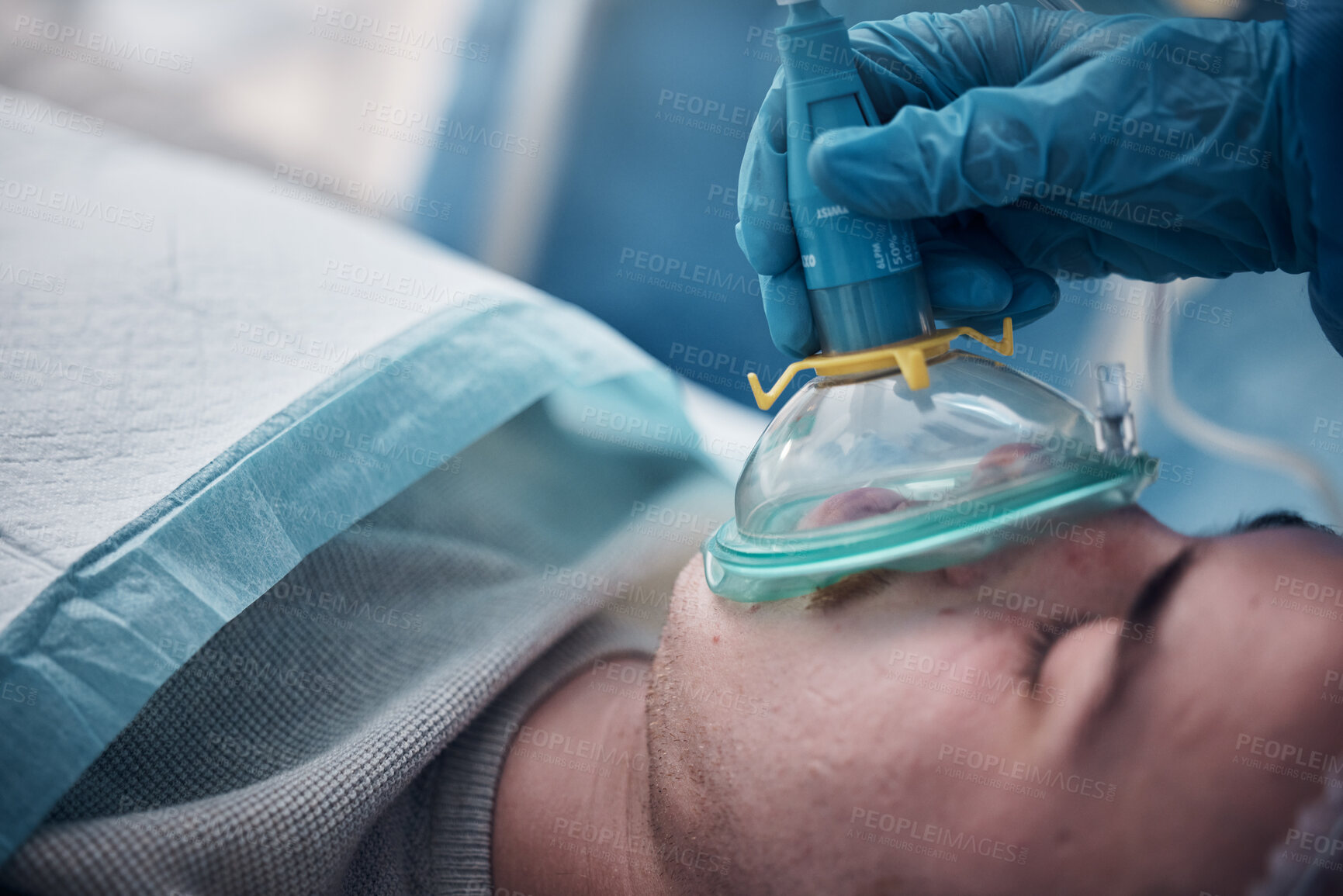 Buy stock photo Anesthesia, oxygen mask and medical with man in surgery for breathing, ventilation and operation. Healthcare, cardiology and paramedic with face of patient and doctors in operating room for emergency