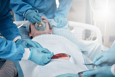 Buy stock photo Doctors, surgery and blood with a medicine team in scrubs operating on a man patient in a hospital. Doctor, nurse and teamwork with a medical group in a clinic to perform an operation