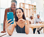 Selfie, friends and a business black woman posing for a photograph in the office with her colleague. Phone, diversity and social media with a female employee and coworker taking a picture at work