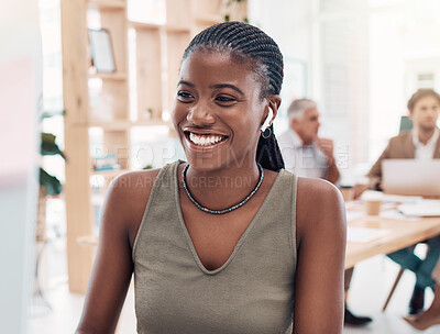 Buy stock photo Music, podcast and woman at computer with earphones in office with streaming service while working. Work, smile and happy black woman listening to streaming radio station app online in modern office.