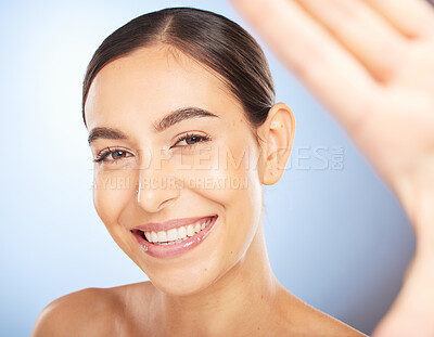 Buy stock photo Selfie, skincare and beauty with a model woman in studio on a gray background for natural treatment. Face, wellness and luxury with an attractive young female posing to promote a skin care product