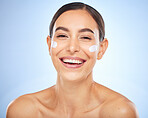 Portrait, skincare and moisturizer with a model woman in studio on a gray background for antiaging beauty. Face, lotion and product with an attractive young female inside to apply facial treatment