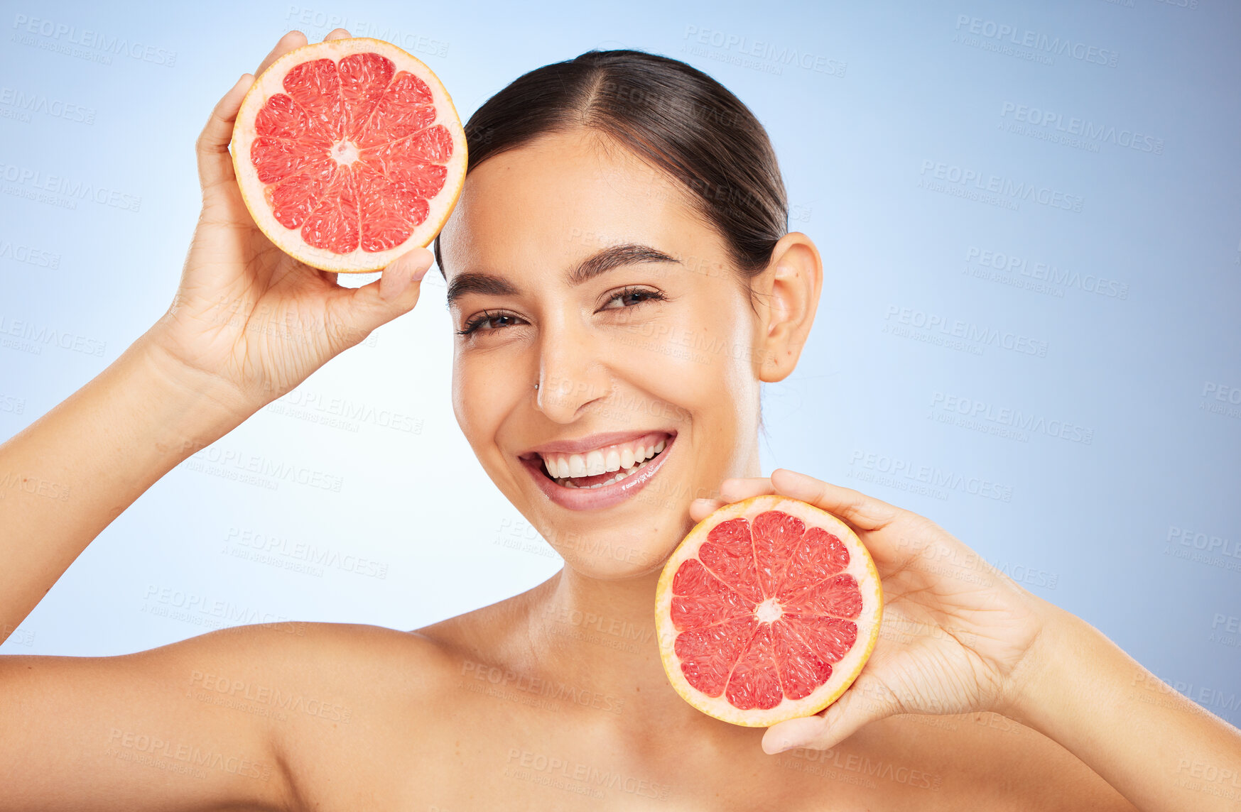 Buy stock photo Beauty, health or woman with grapefruit for skincare wellness, facial cleaning or natural vitamin C in studio. Smile, cosmetics or happy girl model marketing fruit to detox for a glowing smooth face