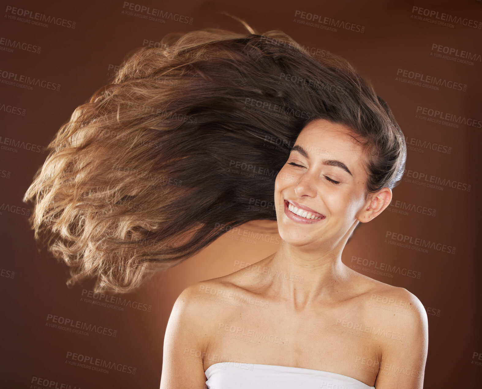 Buy stock photo Hair, beauty and skincare with a model woman in studio on a brown background for natural or keratin treatment. Face, haircare and salon with an attractive young female posing to promote a product