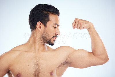 Buy stock photo Asian man, body of bicep flex on studio background in studio for muscle growth progress, healthcare wellness check or bodybuilding success. Sports athlete, coach or bodybuilder flexing arm in fitness