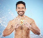 water splash, avocado or portrait of man with skincare, beauty or natural organic products for a glowing body goals. Smile, face or happy male model cleaning or washing with vegan cosmetics in studio