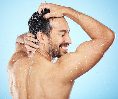 Buy stock photo Shower, clean and man with water, beauty and body care with hygiene, grooming and skincare against studio background. Happy, healthy skin and cleaning body with hair care and water drop with wellness.