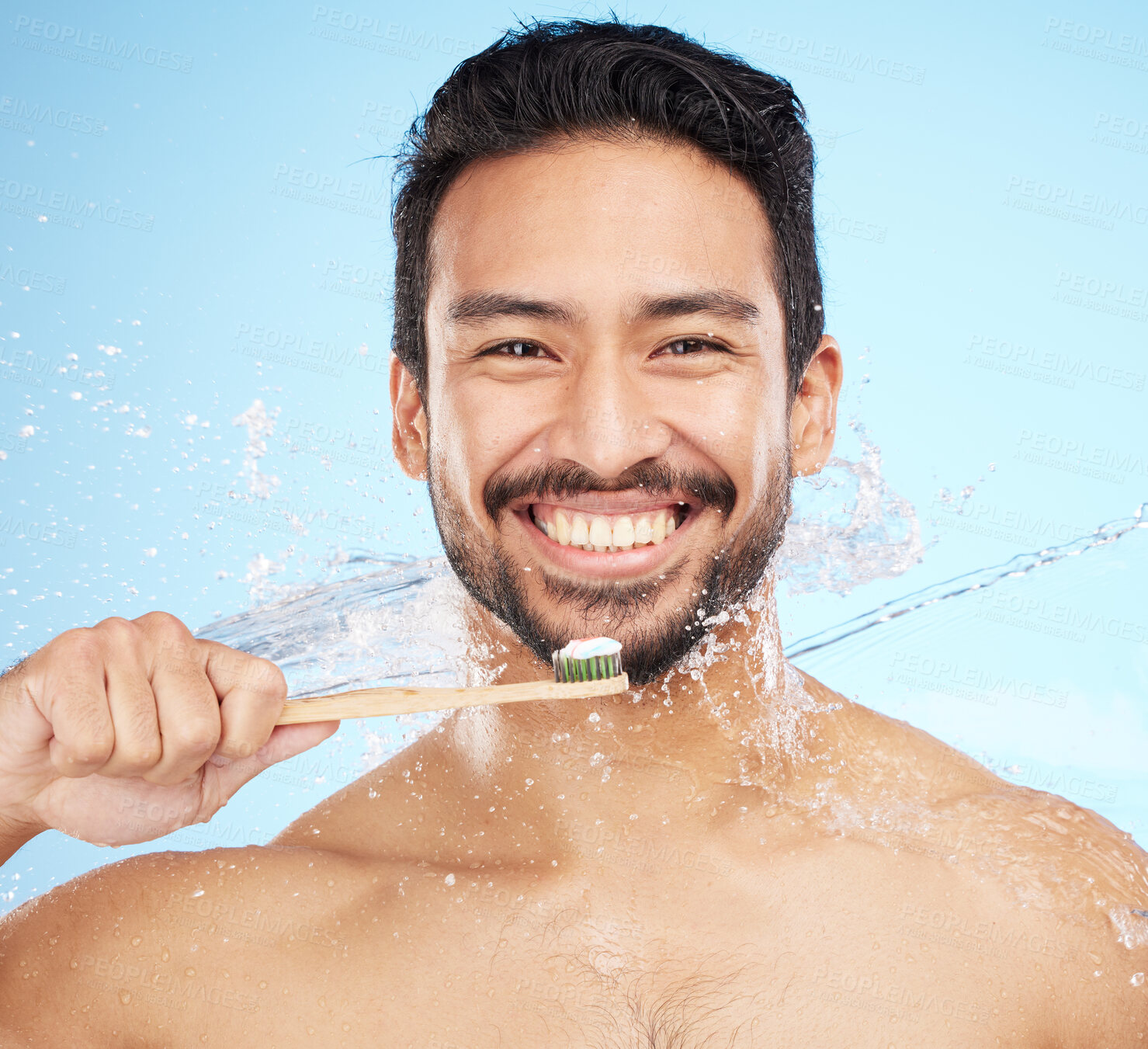 Buy stock photo Water splash, portrait or man brushing teeth in studio with toothbrush for white teeth or oral healthcare. Face, tooth paste or happy person cleaning or washing mouth with a healthy dental smile