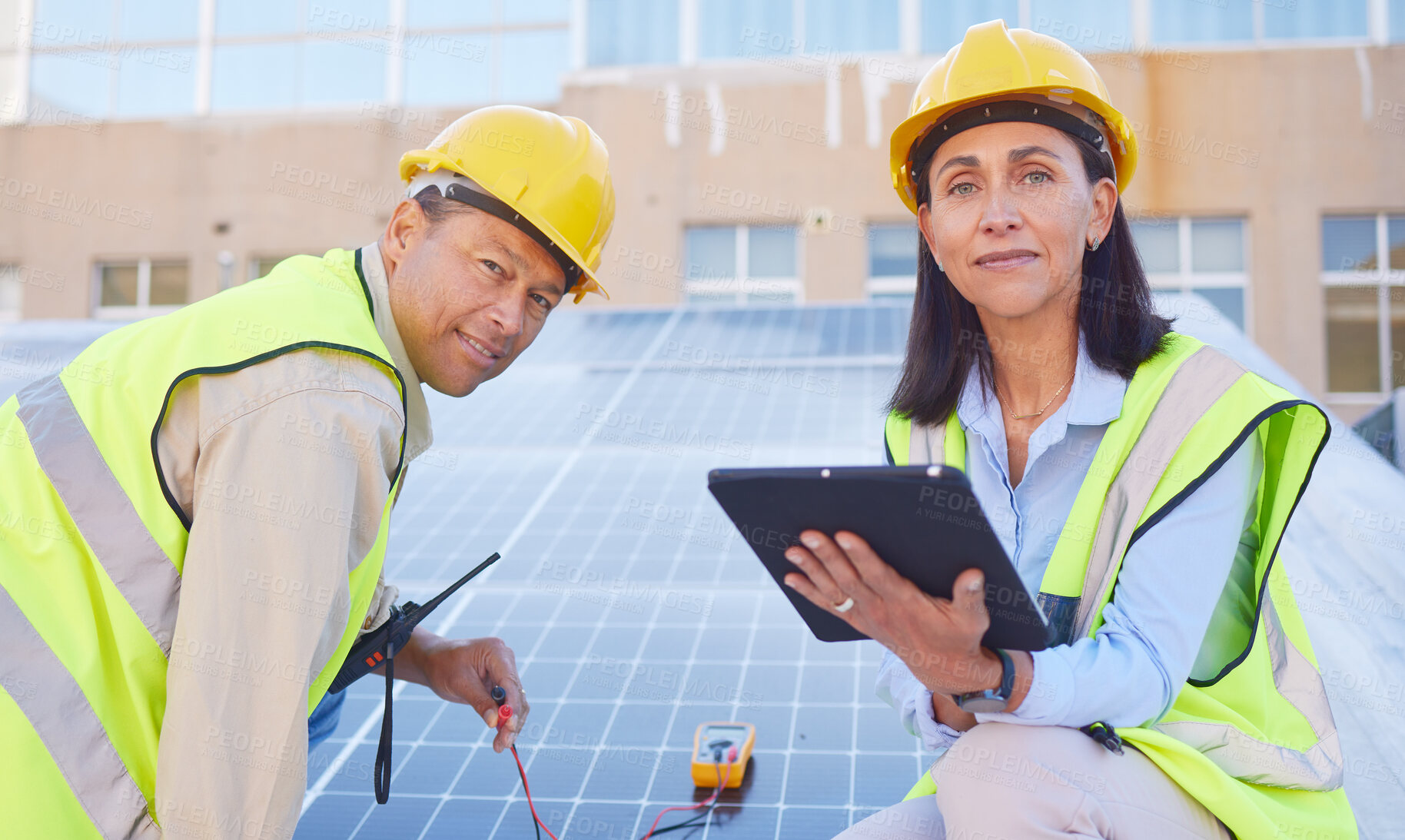 Buy stock photo Tablet, solar energy or engineering team working solar panels or technology on rooftop for renewable energy. Teamwork, portrait or construction workers on a city building for maintenance inspection