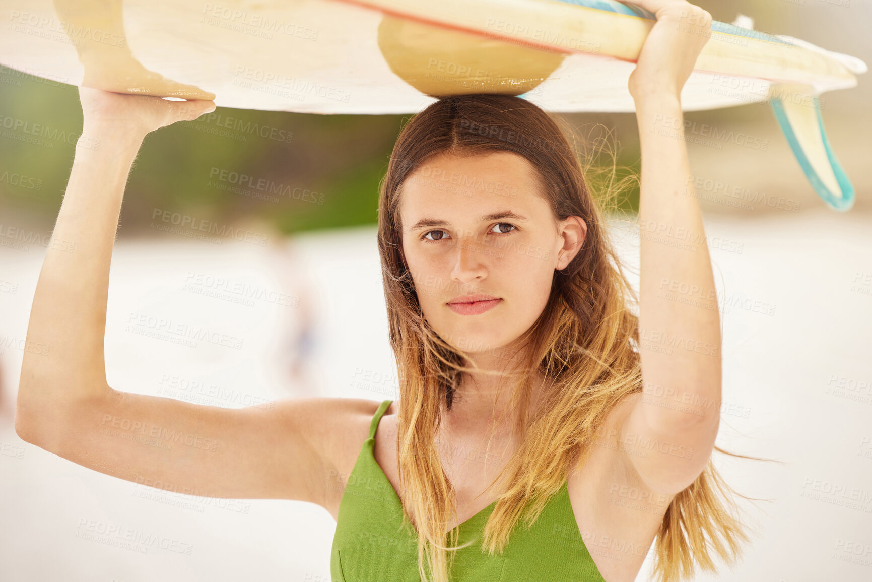 Buy stock photo Woman, portrait and surfer with surfboard at beach, travel and fitness with adventure, exercise and ready to surf in Hawaii. Young girl on holiday, workout and nature with extreme sport and wellness.