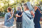 Fitness, nature and senior people doing stretching exercise before cardio training in a park. Health, wellness and active group of elderly friends in retirement doing arm warm up for outdoor workout.