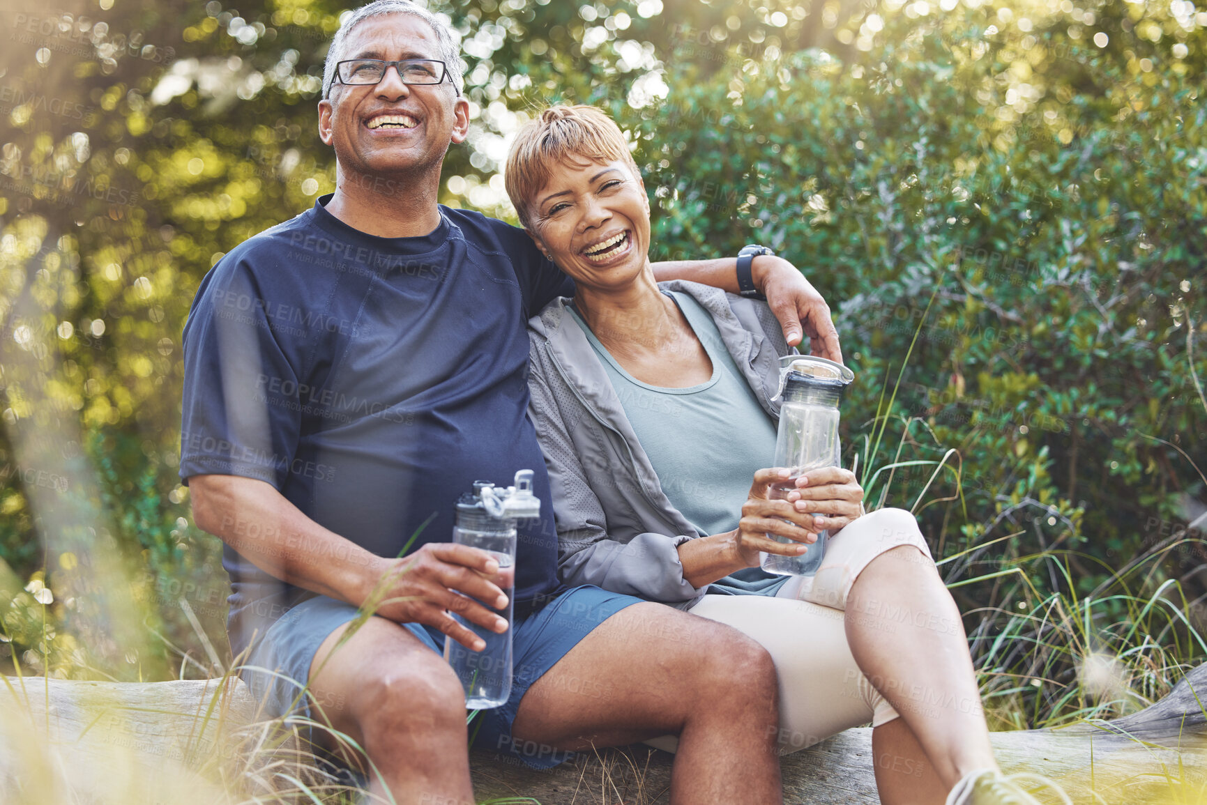 Buy stock photo Nature, hiking and portrait of a senior couple resting while doing outdoor walk for exercise. Happy, smile and elderly man and woman in retirement trekking together for wellness in a forest in Brazil