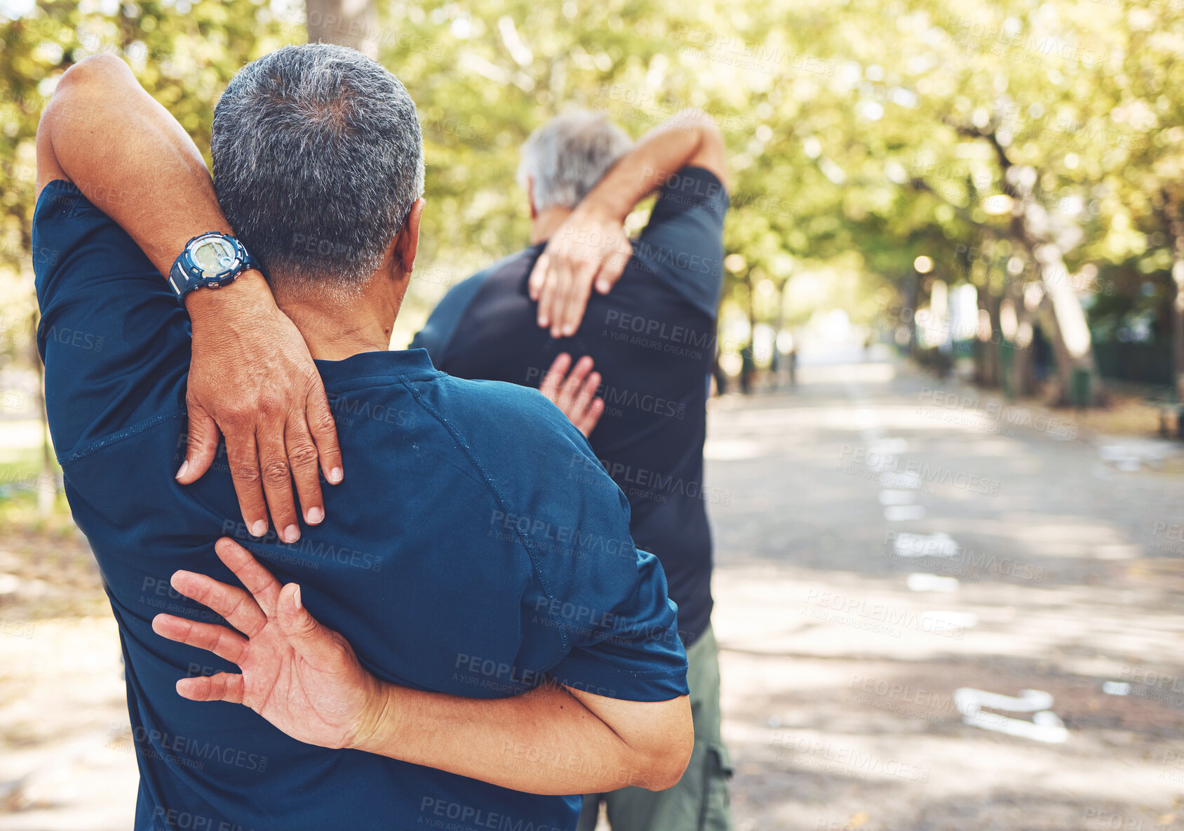 Buy stock photo Fitness, elderly men and stretching in park, ready for running and exercise outdoor with hands and warm up back view. Body training, start run and sports motivation with mature runner and workout.