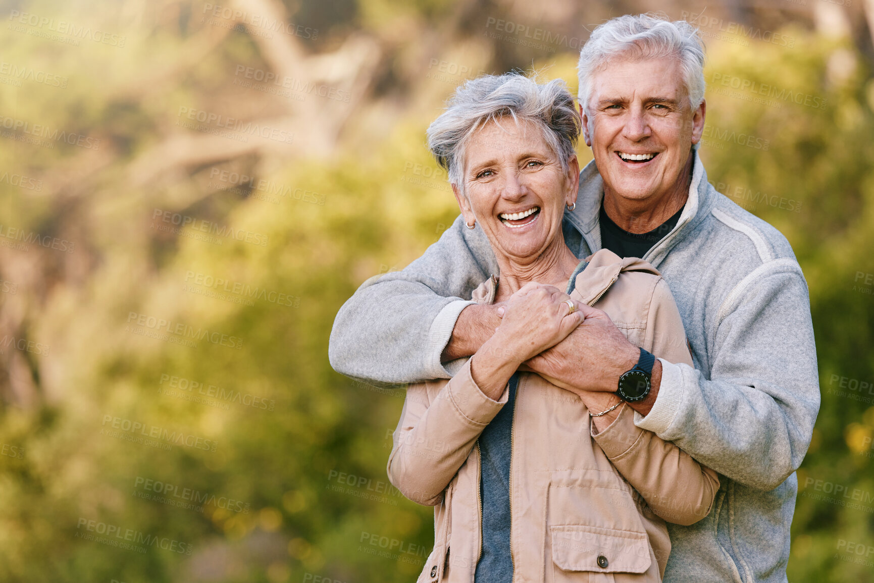 Buy stock photo Nature, love and portrait of a senior couple hugging in a garden while on romantic outdoor date. Happy, smile and elderly people in retirement embracing in park while on a walk for fresh air together