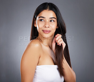 Buy stock photo Beauty, hair care or girl model in studio grooming with healthy natural growth products for self love or self care. Studio background, wellness or beautiful woman with pride, confidence or freedom 